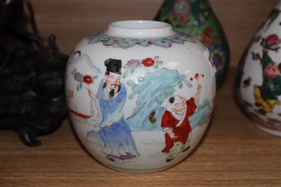 An 18th century Chinese clobbered guglet and two famille rose vases